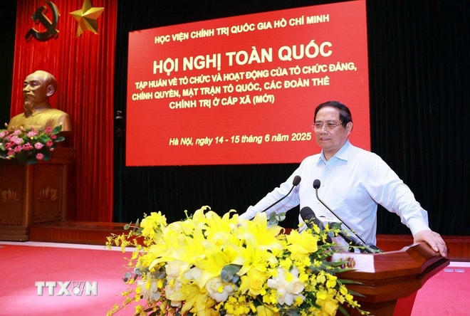 Thủ tướng Phạm Minh Chính phát biểu bế mạc Hội nghị toàn quốc tập huấn về tổ chức và hoạt động của tổ chức Đảng, chính quyền, Mặt trận tổ quốc Việt Nam, các đoàn thể chính trị ở cấp xã (mới). (Ảnh: Dương Giang-TTXVN) ttxvn-thu-tuong-to-chuc-cap-xa-3.jpg