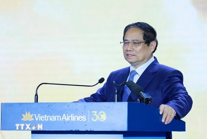 Thủ tướng Phạm Minh Chính phát biểu chúc mừng Tổng Công ty Hàng không Việt Nam. (Ảnh: Dương Giang/TTXVN) ttxvn-0106-thu-tuong-vietnam-airlnes-8.jpg
