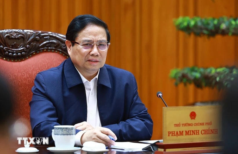 Thủ tướng Phạm Minh Chính chủ trì cuộc họp với các bộ, ngành để tháo gỡ khó khăn, vướng mắc các dự án tồn đọng. (Ảnh: Dương Giang/TTXVN)