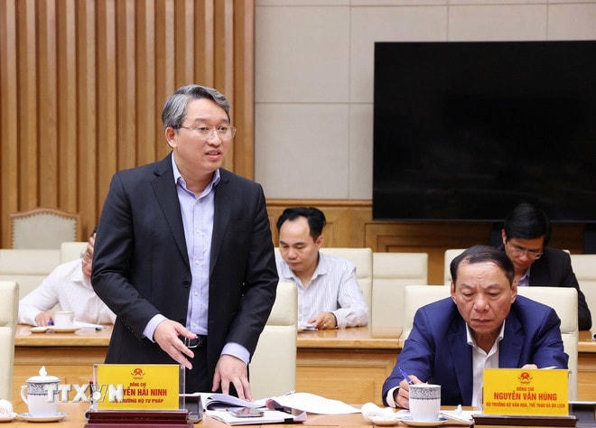 Bộ trưởng Bộ Tư pháp Nguyễn Hải Ninh phát biểu. (Ảnh: Văn Điệp/TTXVN) ttxvn-thu-tuong-pham-minh-chinh-chu-tri-phien-hop-bcd-cua-chinh-phu-ve-tong-ket-viec-thuc-hien-nghi-quyet-so-18-2.jpg