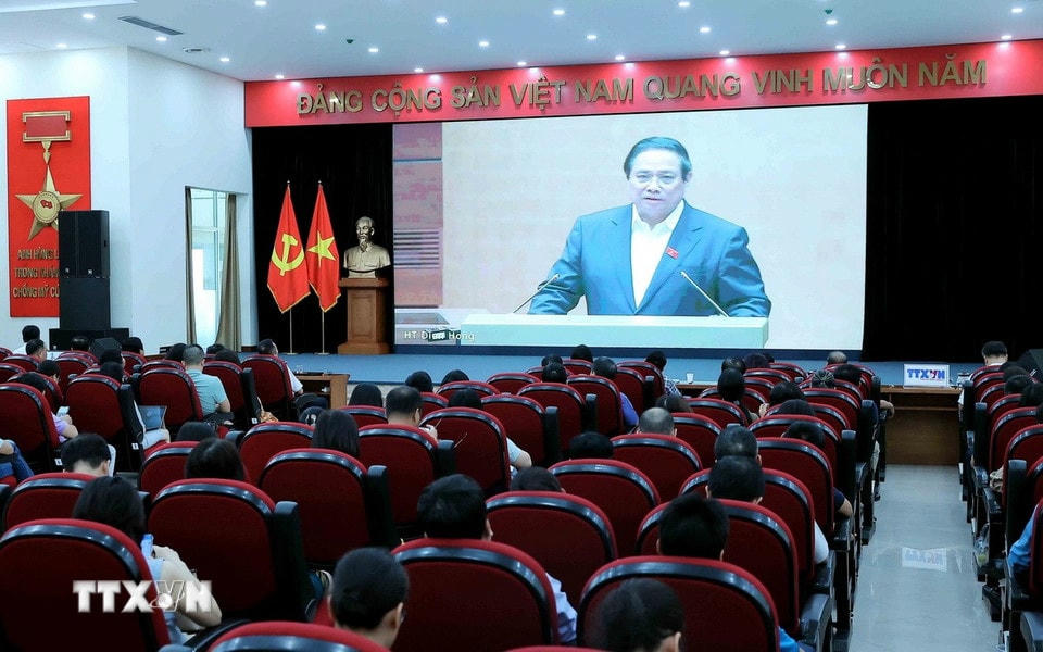 Các đại biểu dự Hội nghị tại điểm cầu Trụ sở Thông tấn xã Việt Nam (số 5 Lý Thường Kiệt, Hà Nội). (Ảnh: An Đăng/TTXVN)