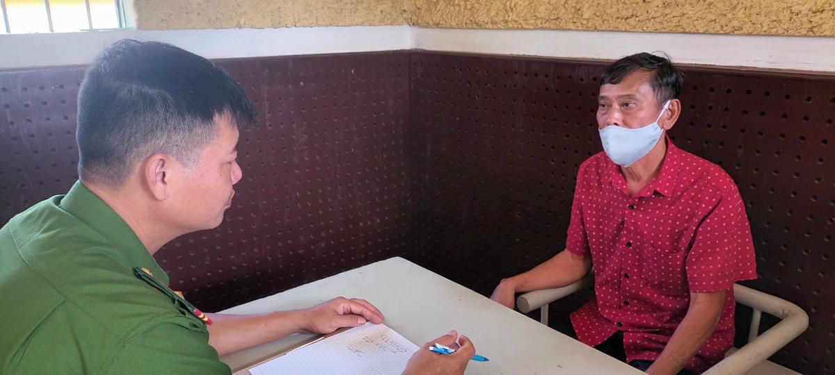 Đinh Thế Minh tại cơ quan Công an.