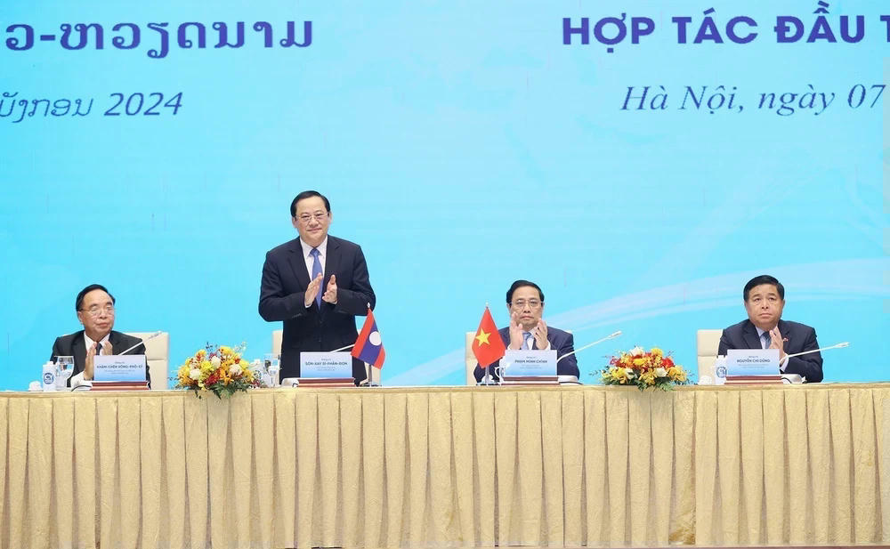 ttxvn-thu-tuong-pham-minh-chinh-va-thu-tuong-lao-sonexay-siphandone-du-hoi-nghi-hop-tac-dau-tu-viet-nam-lao-3-4029.jpg