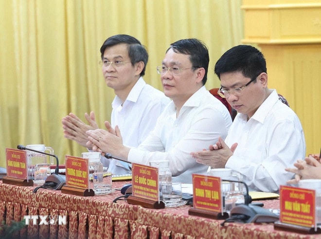 Các đại biểu tham dự buổi làm việc. (Ảnh: Thống Nhất/TTXVN) ttxvn-ha-nam-nam-dinh-ninh-binh-1.jpg