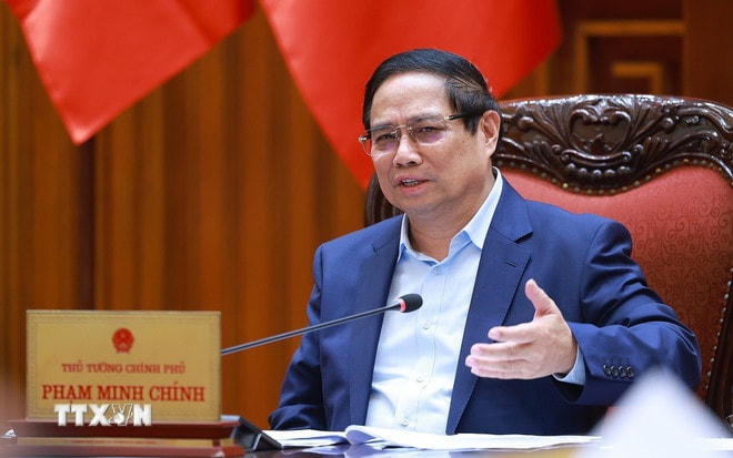 Thủ tướng Phạm Minh Chính chủ trì cuộc họp về việc Hoa Kỳ áp mức thuế đối ứng lên hàng hóa nhập khẩu từ Việt Nam. (Ảnh: Dương Giang/TTXVN) ttxvn-thu-tuong-ap-thue-xuat-khau-3.jpg