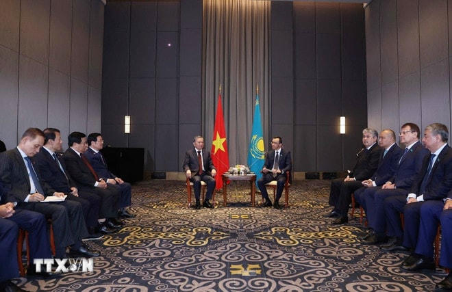 ttxvn-tong-bi-thu-to-lam-hoi-kien-chu-tich-thuong-vien-kazakhstan-2.jpg