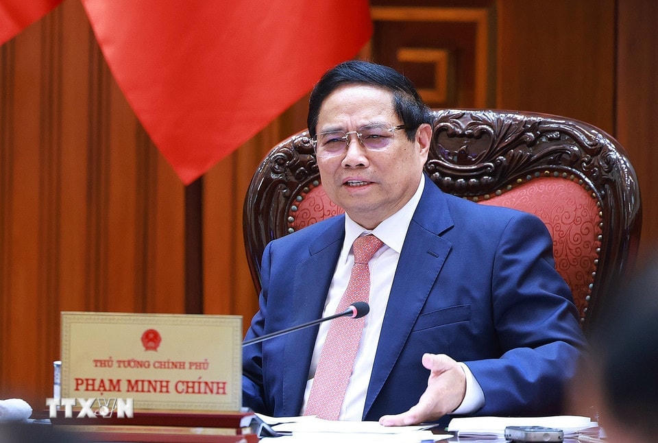 Thủ tướng Phạm Minh Chính chủ trì cuộc họp với Bộ Giáo dục và Đào tạo; Bộ Y tế. (Ảnh: Dương Giang/TTXVN)