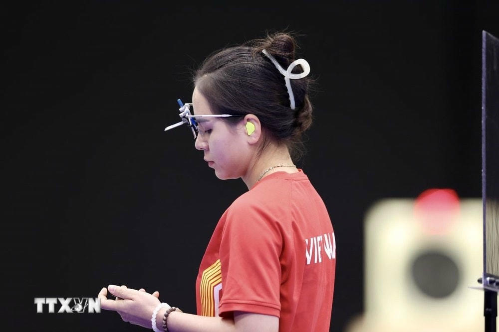 Trịnh Thu Vinh bị loại khỏi lượt bắn tranh huy chương. (Ảnh: Hoàng Linh/TTXVN) ttxvn_trinh_thu_vinh_thi_dau_khong_thanh_cong_0408.jpg