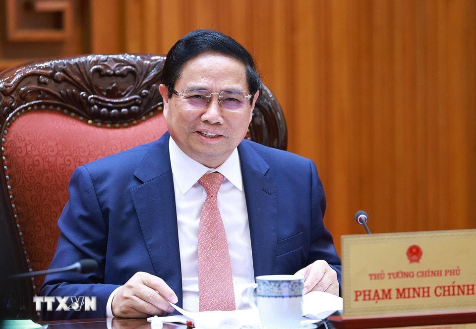 Thủ tướng Phạm Minh Chính chủ trì cuộc họp với với Bộ Giáo dục và Đào tạo; Bộ Y tế. (Ảnh: Dương Giang/TTXVN)