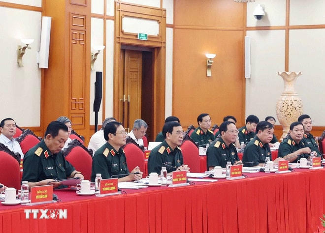 Các đồng chí Ban Thường vụ Quân ủy Trung ương tại buổi làm việc. (Ảnh: Thống Nhất/TTXVN) ttxvn-tong-bi-thu-quan-uy-trung-uong-3.jpg