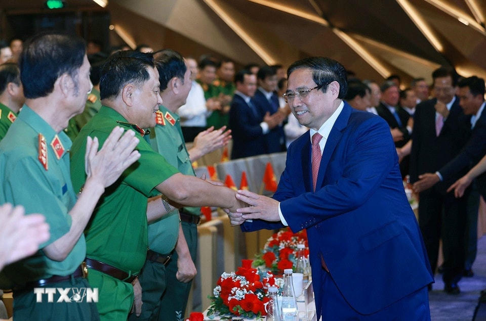 Thủ tướng Phạm Minh Chính với các đại biểu dự Đại hội Thi đua “Vì an ninh Tổ quốc” lần thứ 9. (Ảnh: Dương Giang/TTXVN)