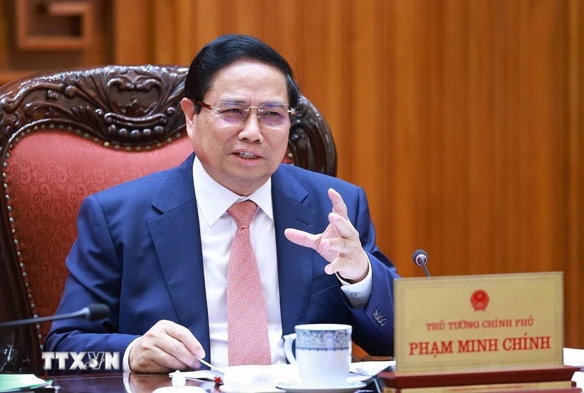 Thủ tướng Phạm Minh Chính chủ trì cuộc họp với với Bộ Giáo dục và Đào tạo; Bộ Y tế. (Ảnh: Dương Giang/TTXVN)