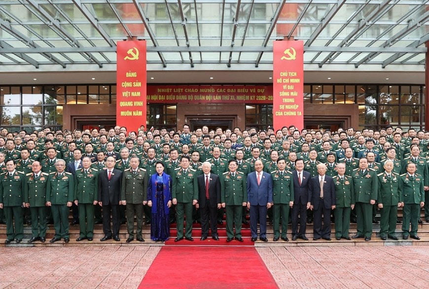 Tổng Bí thư, Chủ tịch nước, Bí thư Quân ủy Trung ương Nguyễn Phú Trọng và Thủ tướng Chính phủ Nguyễn Xuân Phúc, Chủ tịch Quốc hội Nguyễn Thị Kim Ngân và các đại biểu dự Đại hội. (Ảnh: Trí Dũng/TTXVN)