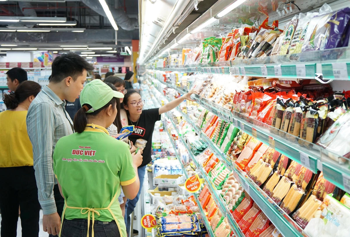 Thị trường trong nước chính là mảnh đất giàu tiềm năng để DN Việt khai thác. Ảnh: Phạm Quang Vinh