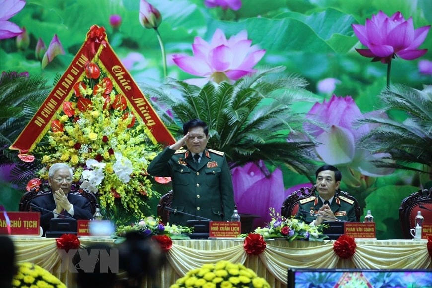 Đại tướng Ngô Xuân Lịch, Uỷ viên Bộ Chính trị, Phó Bí thư Quân uỷ Trung ương, Bộ trưởng Bộ Quốc phòng phát biểu khai mạc. (Ảnh: Trí Dũng/TTXVN)