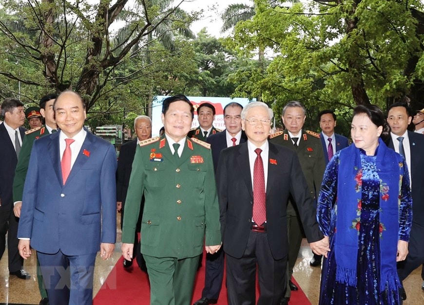  Tổng Bí thư, Chủ tịch nước, Bí thư Quân ủy Trung ương Nguyễn Phú Trọng và Thủ tướng Chính phủ Nguyễn Xuân Phúc, Chủ tịch Quốc hội Nguyễn Thị Kim Ngân cùng các đồng chí lãnh đạo, nguyên lãnh đạo Đảng, Nhà nước tới dự.(Ảnh: Trí Dũng/TTXVN)