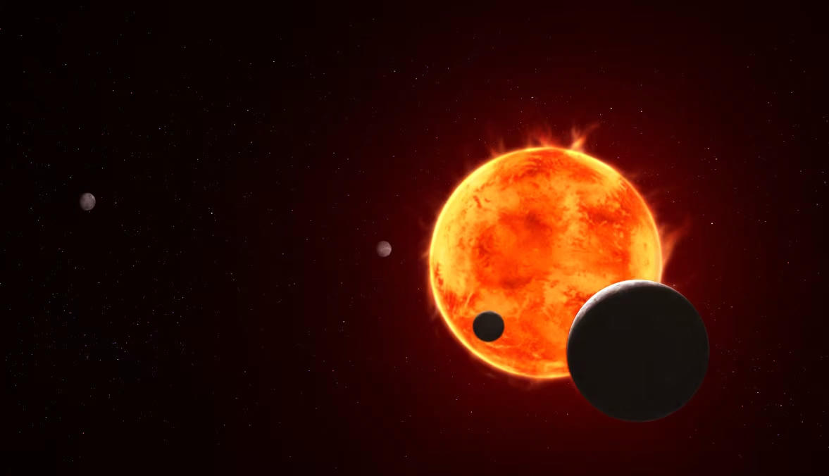 Ngoại hành tinh có kích thước bằng Trái Đất, cách chúng ta 40 năm ánh sáng, có tên là TRAPPIST-1 e, nằm ở góc dưới bên phải trong hình minh họa này, có thể có bầu khí quyển đủ khả năng duy trì nước ở dạng lỏng. Nguồn: NASA.