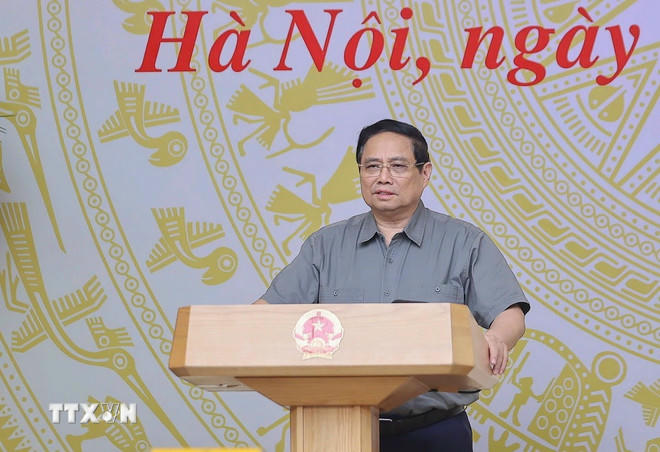 Thủ tướng Chính phủ Phạm Minh Chính chủ trì phiên họp. (Ảnh: Dương Giang/TTXVN) .
