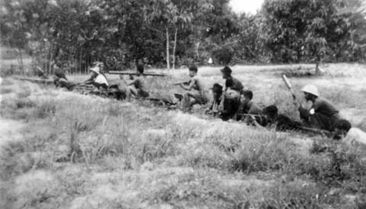 Bộ đội và công nhân phục kích quân Pháp tại mặt trận Sài Gòn, cuối tháng 9/1945. 	Ảnh: tư liệu lịch sử. Ảnh: tư liệu lịch sử