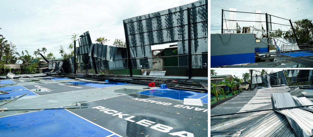 Hệ thống hàng rào, cột thép tại sân Pickleball bị quật đổ, nhiều mảnh vỡ nằm la liệt. Ảnh: Cẩm Kỳ