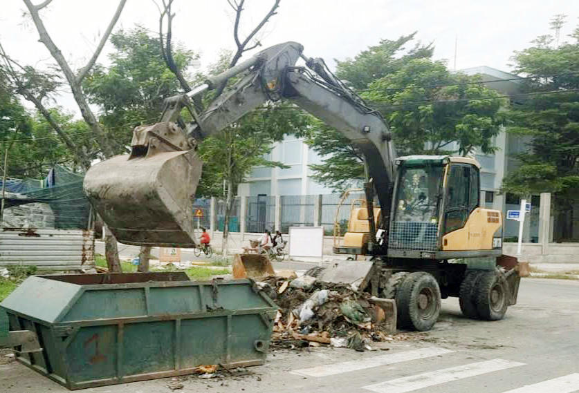 Các điểm tập kết rác trong khu dân cư được dọn đẹp. Ảnh: Nguyễn Tú.
