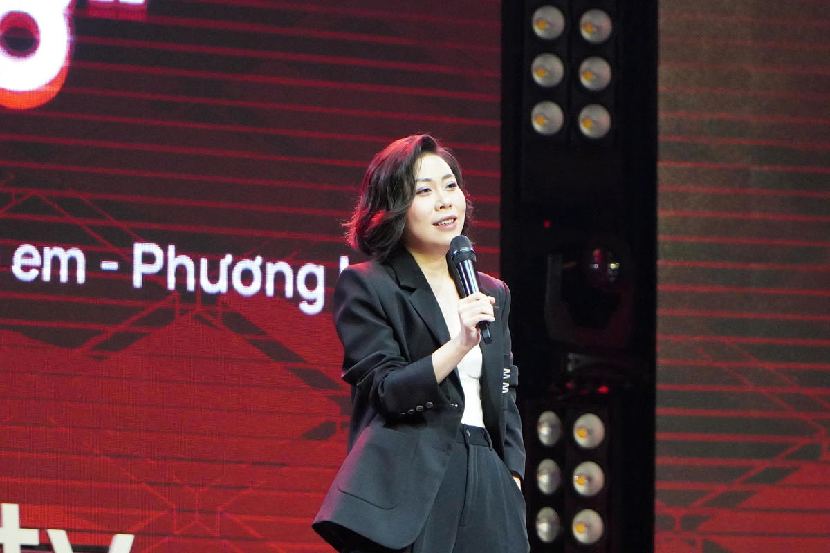 Bà Phạm Thùy Trang, Trưởng phòng Truyền thông Marketing, Trường Đại học Thăng Long phát biểu tại hội thảo.