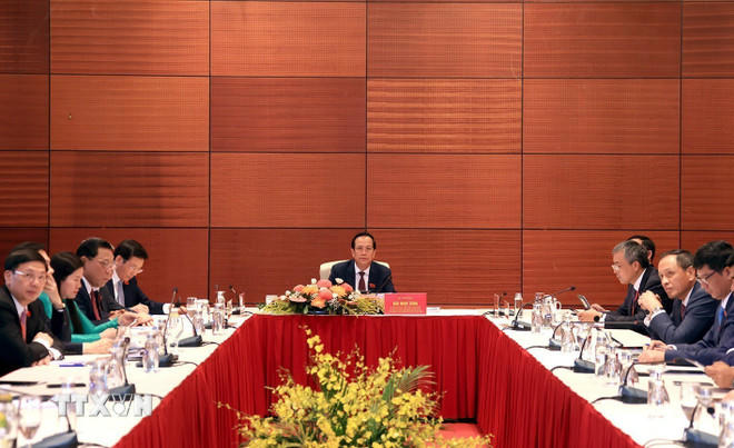 Đồng chí Đào Ngọc Dung, Ủy viên Ban Chấp hành Trung ương Đảng, Ủy viên Ban Chấp hành Đảng bộ Chính phủ, Bí thư Đảng ủy, Bộ trưởng Bộ Dân tộc và Tôn giáo thảo luận tại tổ 4. (Ảnh: Tuấn Anh/TTXVN)