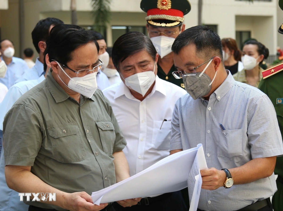  Vượt qua đại dịch COVID-19, Việt Nam duy trì ổn định, phục hồi và phát triển kinh tế-xã hội. (Ảnh: TTXVN) 