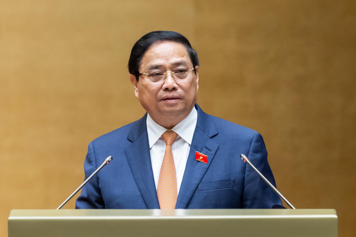 Thủ tướng Phạm Minh Chính báo cáo kết quả thực hiện Kế hoạch phát triển kinh tế - xã hội năm 2025 và 5 năm 2021 - 2025; dự kiến kế hoạch phát triển kinh tế - xã hội năm 2026. Ảnh: Quang Vinh.