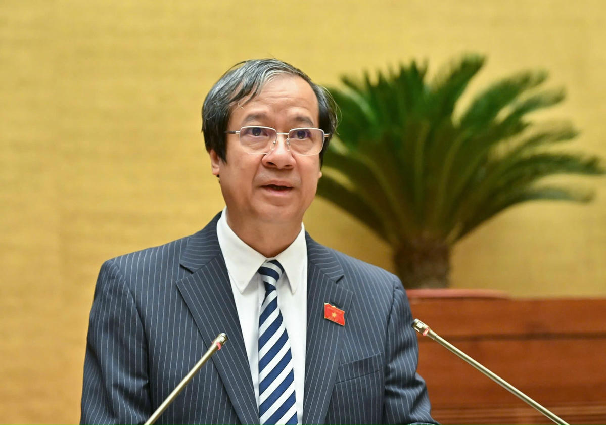 Bộ trưởng Bộ Giáo dục và đào tạo Nguyễn Kim Sơn báo cáo trước Quốc hội (Ảnh: Quang Vinh)