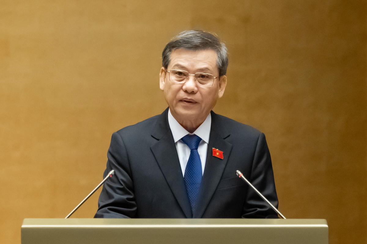 Chánh án Tòa án nhân dân tối cao Lê Minh Trí báo cáo Tờ trình về dự án Luật Phá sản (sửa đổi). Ảnh: Quang Vinh.