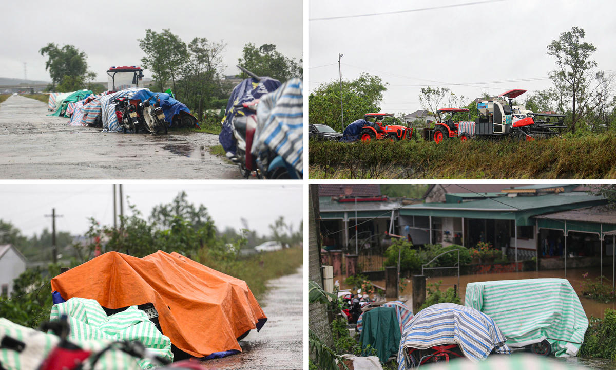 Nhiều chiếc được phủ bạt kín mít, trở thành biểu tượng của tình trạng ứng phó “tạm thời nhưng cấp bách” của người dân. Ảnh: Cẩm Kỳ 