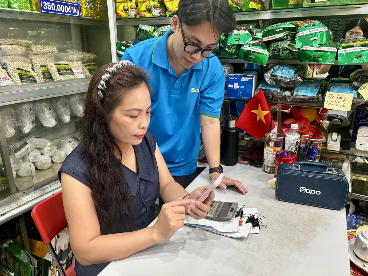 Hỗ trợ công nghệ cho hộ kinh doanh. Ảnh: BTC.