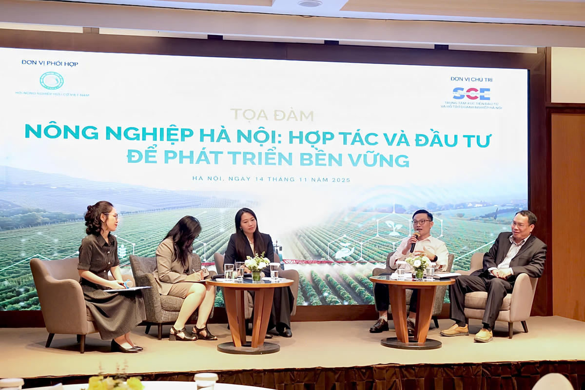 Ông Trần Trung Mỹ (áo trắng) chia sẻ tại Tọa đàm Nông nghiệp Hà Nội: Hợp tác và đầu tư để phát triển bền vững.