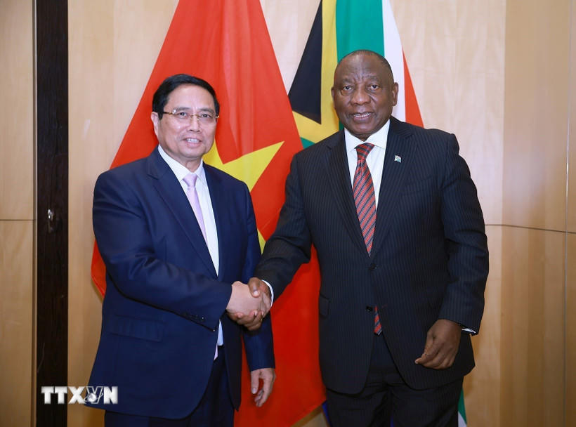 Thủ tướng Phạm Minh Chính hội kiến Tổng thống Cộng hòa Nam Phi Matamela Cyril Ramaphosa. (Ảnh: Dương Giang/TTXVN)