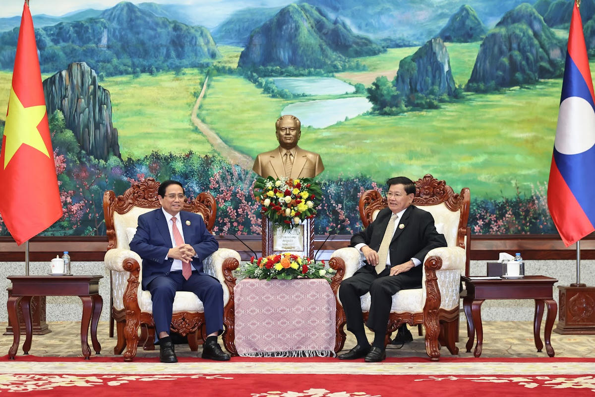 Thủ tướng đề nghị Lào tiếp tục tạo điều kiện cho các doanh nghiệp Việt Nam đầu tư, kinh doanh tại Lào - Ảnh: VGP/Nhật Bắc