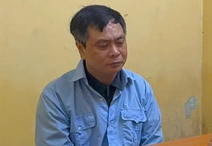 Bị can Phạm Văn Long, Hiệu trưởng Trường Cao đẳng Du lịch Hà Nội tại cơ quan Công an. Ảnh CA HN