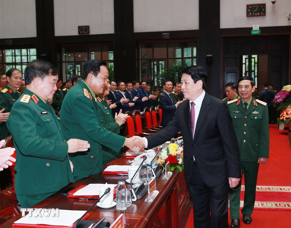 Chủ tịch nước Lương Cường với các đại biểu dự hội nghị. (Ảnh: Trọng Đức/TTXVN)