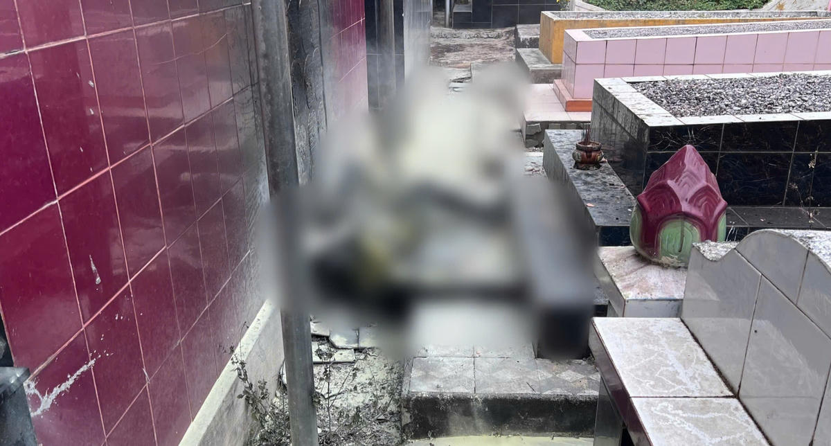 Nơi phát hiện thi thể anh Đ. ở nghĩa trang. Ảnh: CV.