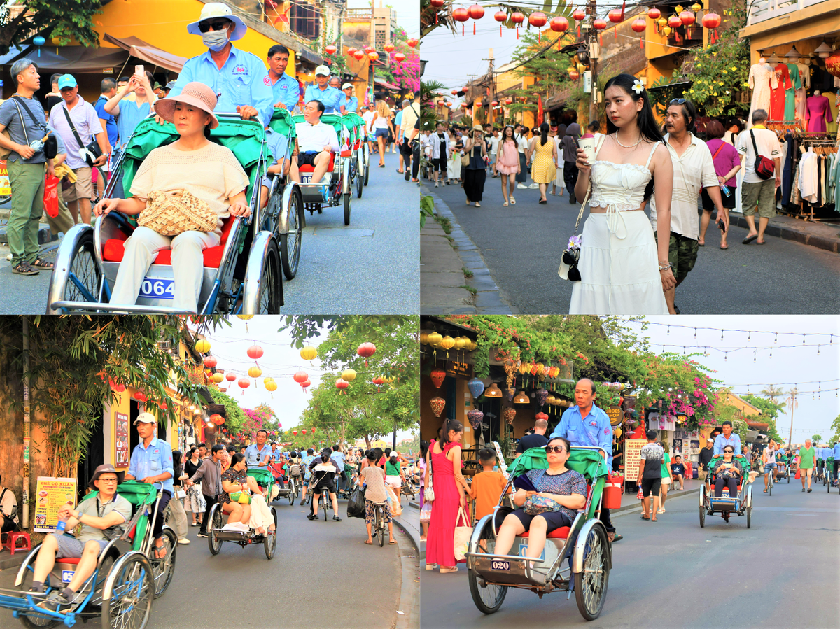 Du khách ngồi xích lô dạo trên đường Bạch Đằng, Trần Phú, phường Hội An. Ảnh: Tấn Thành.