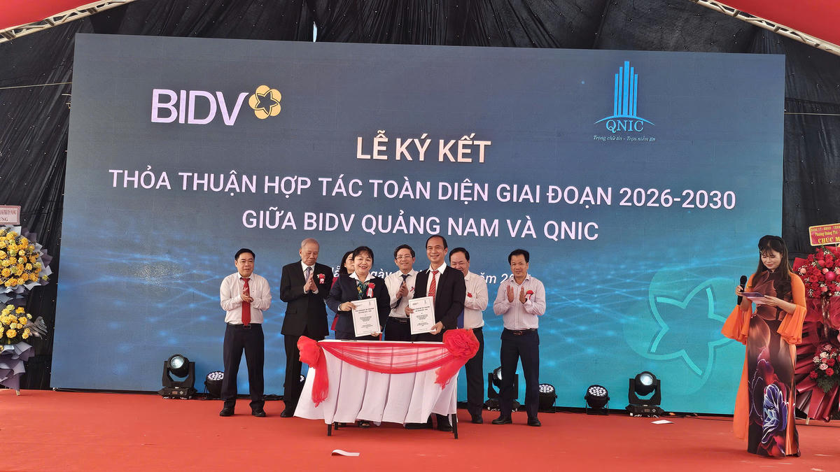 Lễ ký kết thỏa thuận hợp tác toàn diện giai đoạn 2026-2030 giữa BIDV Quảng Nam và QNIC. Ảnh: Chí Đại.