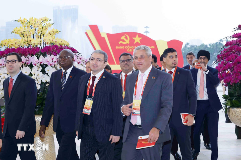 Các đại biểu quốc tế đến dự phiên khai mạc Đại hội XIV của Đảng. (Ảnh: TTXVN)