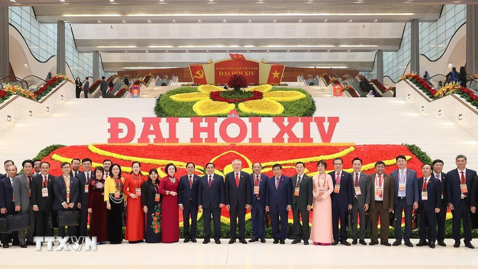 Các đại biểu dự phiên khai mạc Đại hội chụp ảnh lưu niệm. (Ảnh: TTXVN)