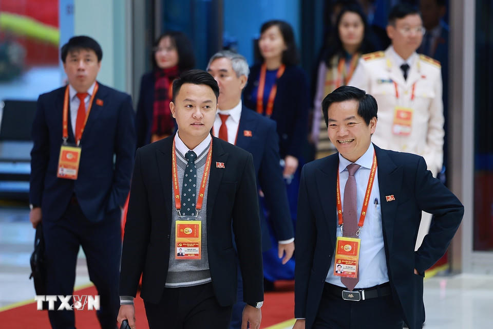 Các đại biểu đến dự ngày làm việc thứ tư Đại hội XIV của Đảng, sáng 22/1. (Ảnh: TTXVN)