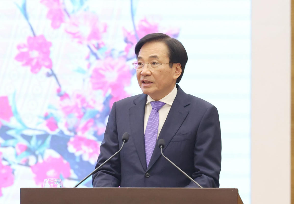 Bộ trưởng, Chủ nhiệm Văn phòng Chính phủ Trần Văn Sơn, Người phát ngôn của Chính phủ, chủ trì họp báo Chính phủ thường kỳ tháng 1/2026. Ảnh: VGP