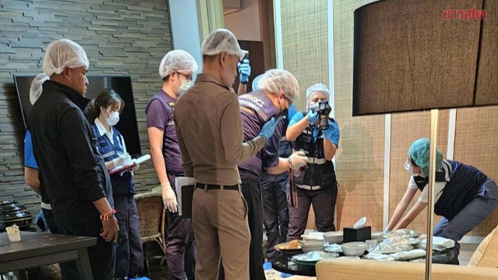 Nhân viên pháp y làm việc tại hiện trường.