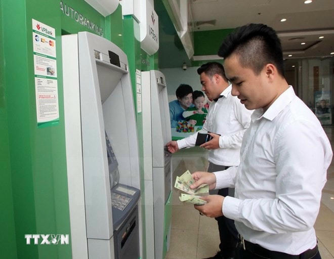 Bộ Lao động-Thương binh và Xã hội sẽ tiếp tục tham mưu Chính phủ ban hành mức lương tối thiểu đối với người lao động làm việc theo hợp đồng lao động trong năm 2025. (Ảnh: TTXVN) ttxvn_ATM.jpg