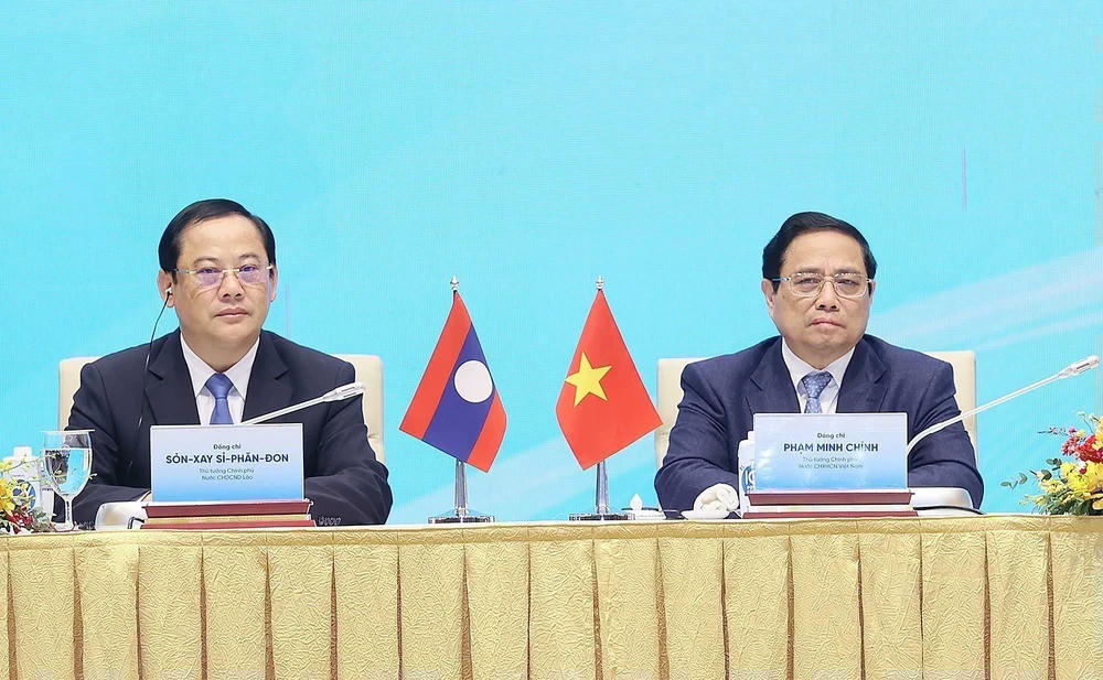 ttxvn-thu-tuong-pham-minh-chinh-va-thu-tuong-lao-sonexay-siphandone-du-hoi-nghi-hop-tac-dau-tu-viet-nam-lao-12-4047.jpg