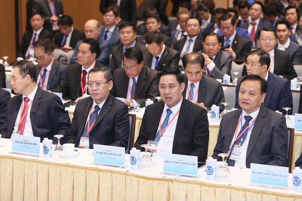 ttxvn-thu-tuong-pham-minh-chinh-va-thu-tuong-lao-sonexay-siphandone-du-hoi-nghi-hop-tac-dau-tu-viet-nam-lao-4-7684.jpg
