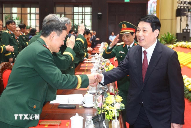 ttxvn-chu-tich-nuoc-luong-cuong-ngay-truyen-thong-dan-quan-tu-ve-3.jpg